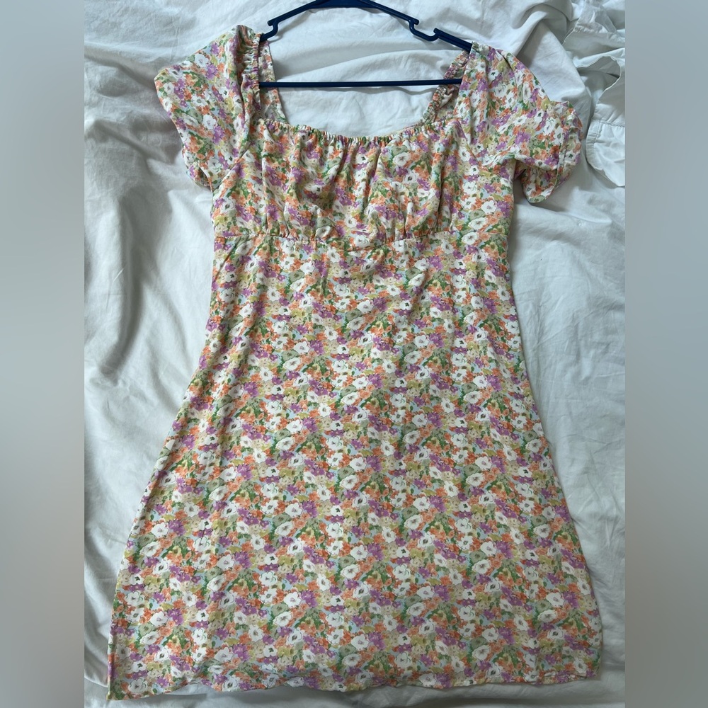 PINK LILY | WILD FLOWER LOVE FLORAL RUCHED MULTICOLOR FLORAL DRESS
Large NEW